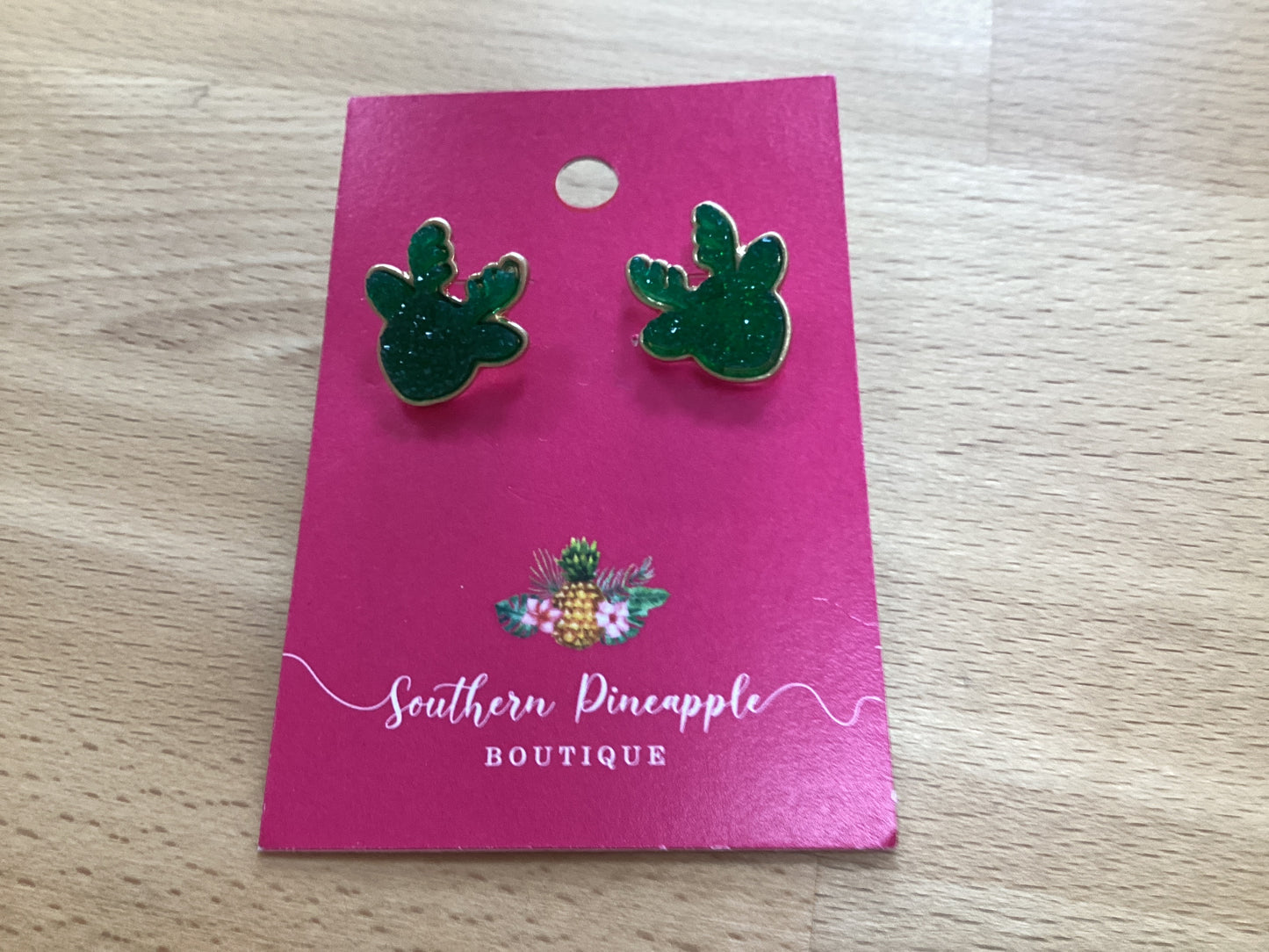 Green crystal reindeer studs