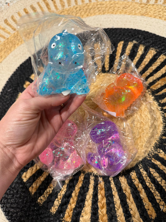 Glitter Dinosaur Slow Rise Squishy Toy