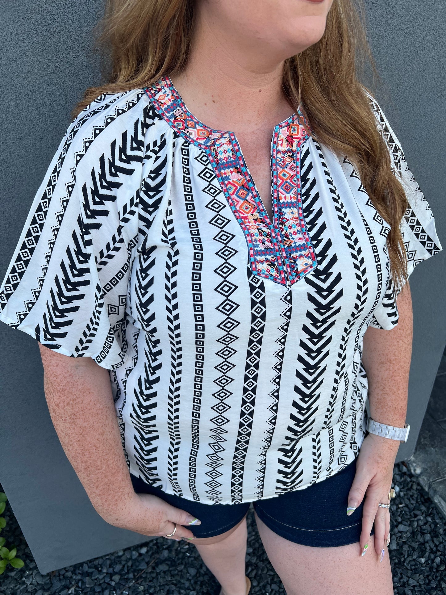 Black and white embroidered blouse