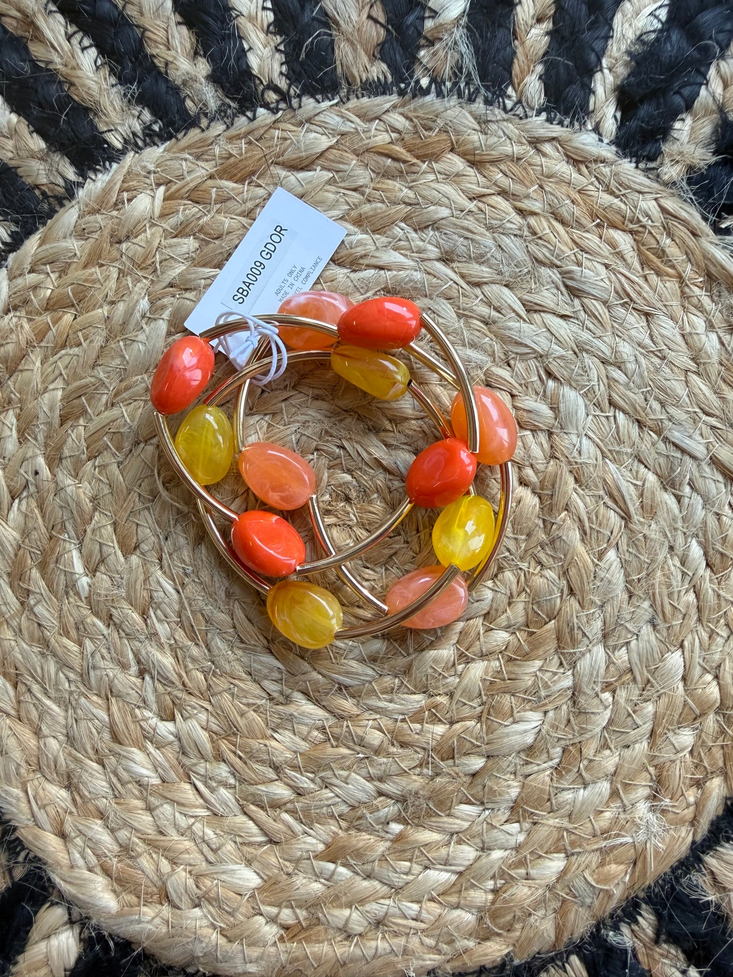 Orange Beaded Bracelet Stack with Gold Accents