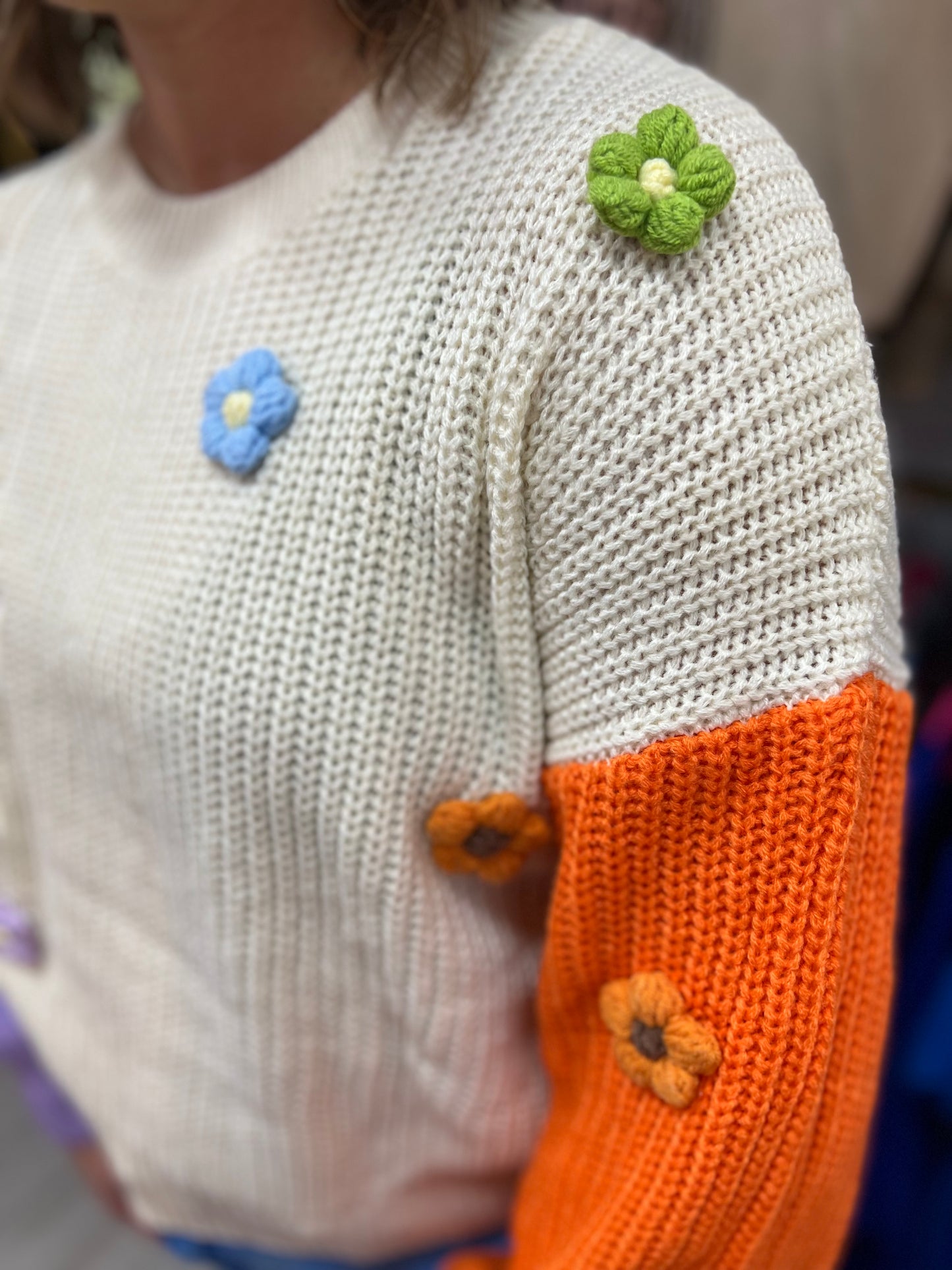 Crocheted flowered sweater