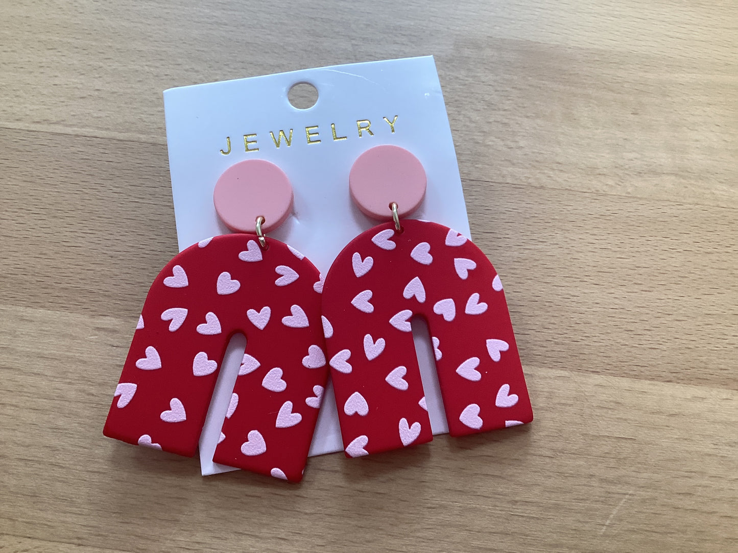 U shaped dangle heart earrings